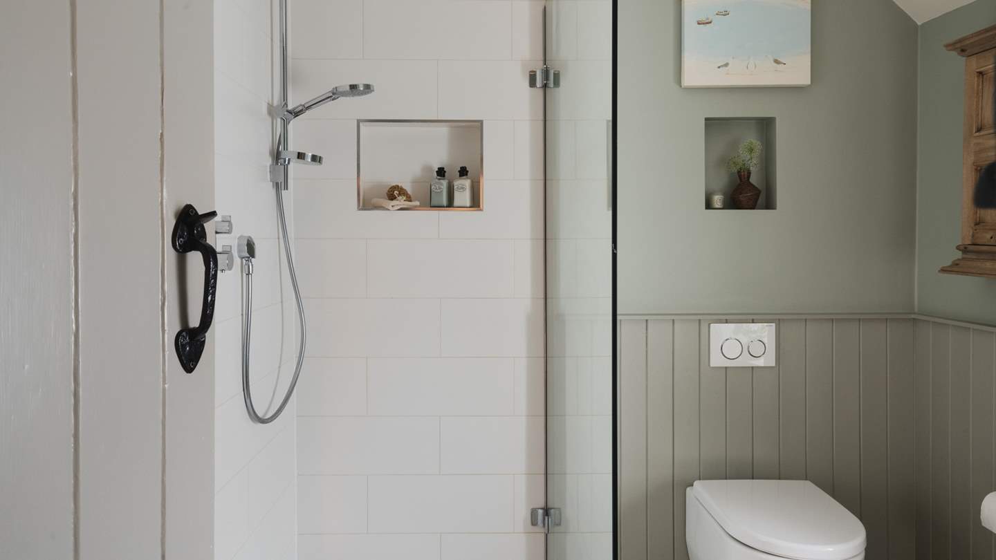 Continuing the vision of verdant bliss, the family bathroom can be found on the first floor