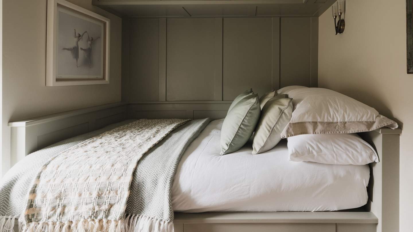 Also decorated in tranquil earthy tones, the second bedroom invites for peaceful moments of rest