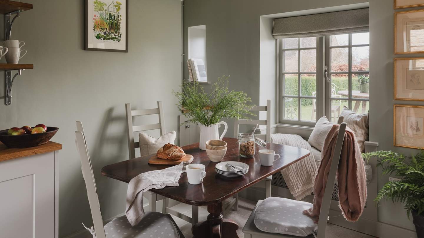 A dining table and chairs for four are in place for magical mealtimes 