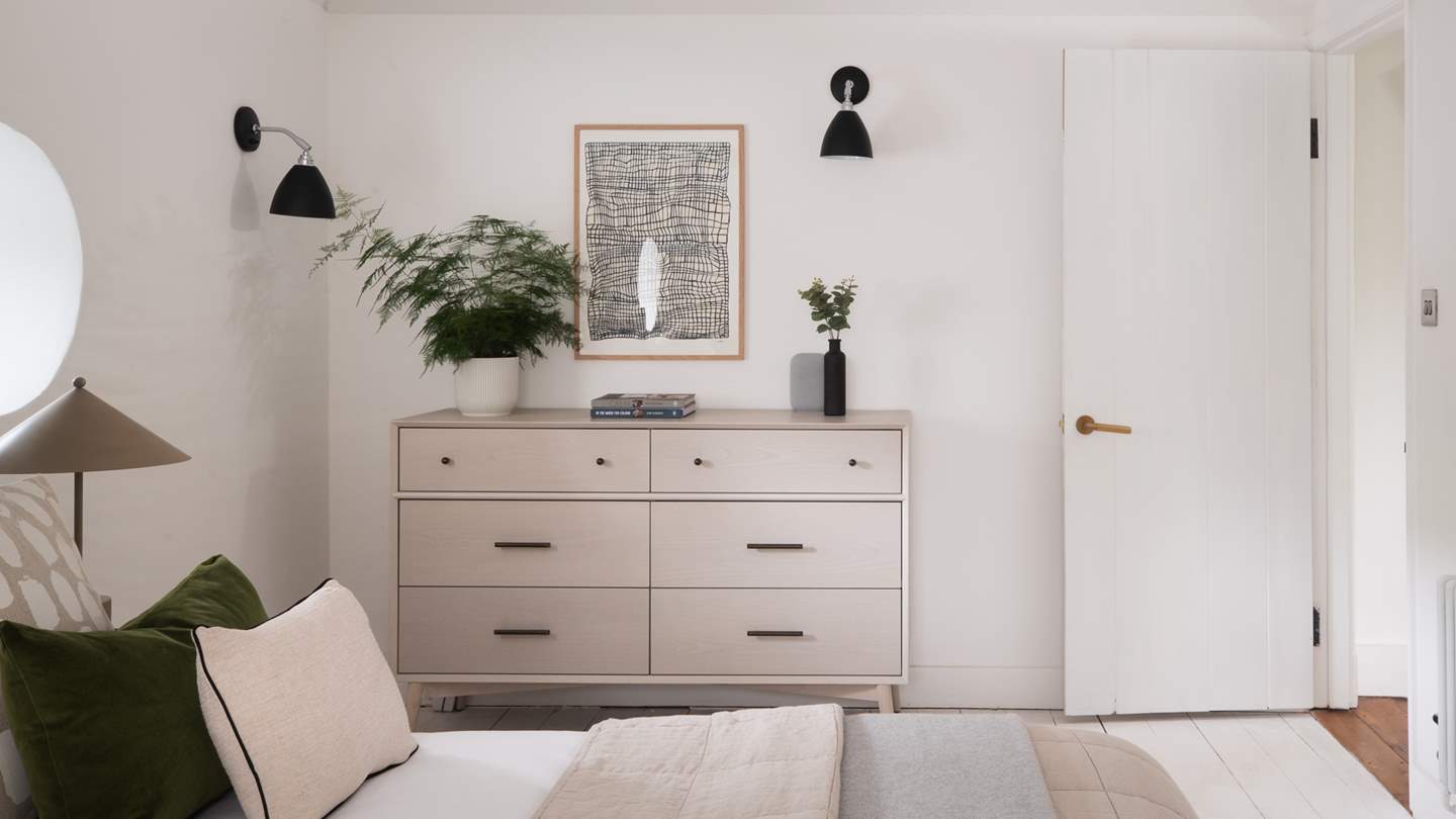 We just adore the lively prints and porthole-style windows 