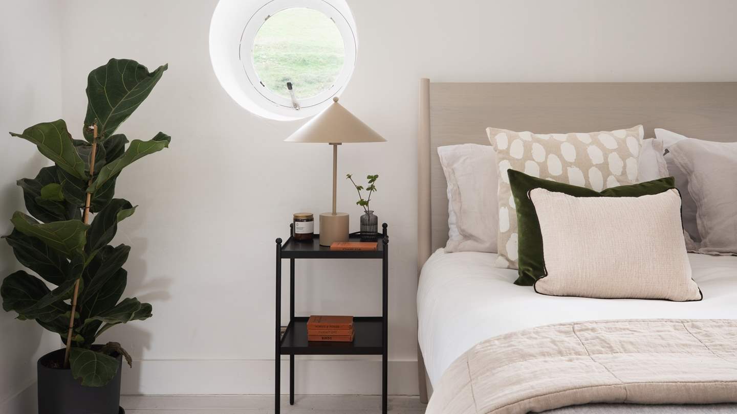 Here you'll find a king-sized bed, a large mirror and a chest of drawers for storing your belongings 