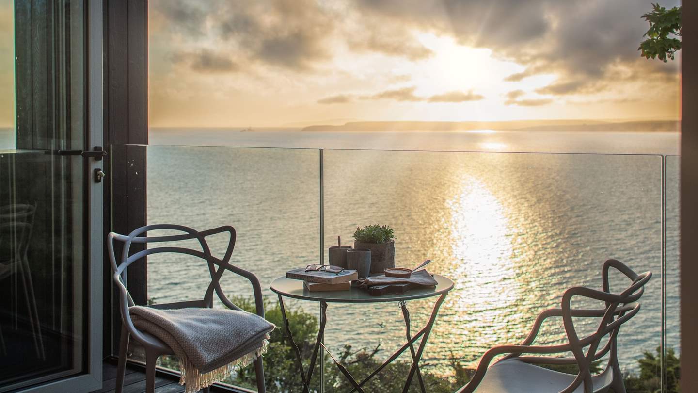 Enjoy freshly brewed morning coffees on the balcony from the charming bistro tables