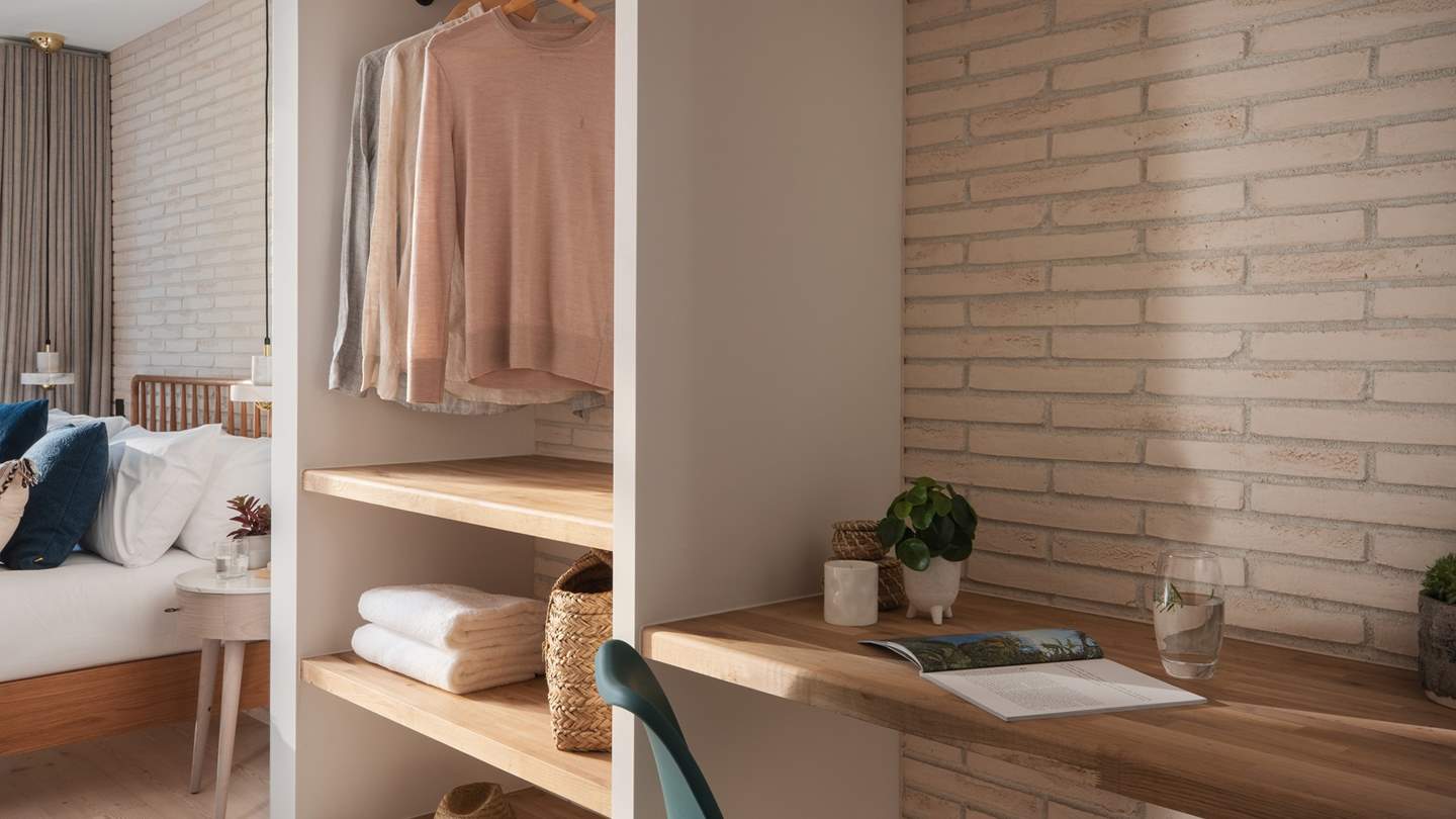 Next to the wardrobe, you will find a lovely dressing table, which can also be used as a study table should you need to catch up on an email or two