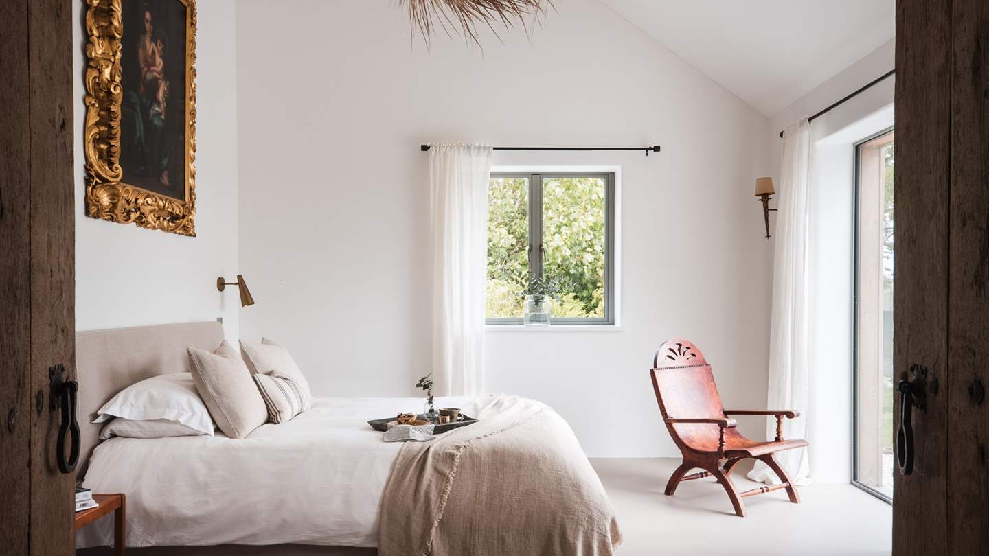 The sumptuous master bedroom exudes Castilian elegance