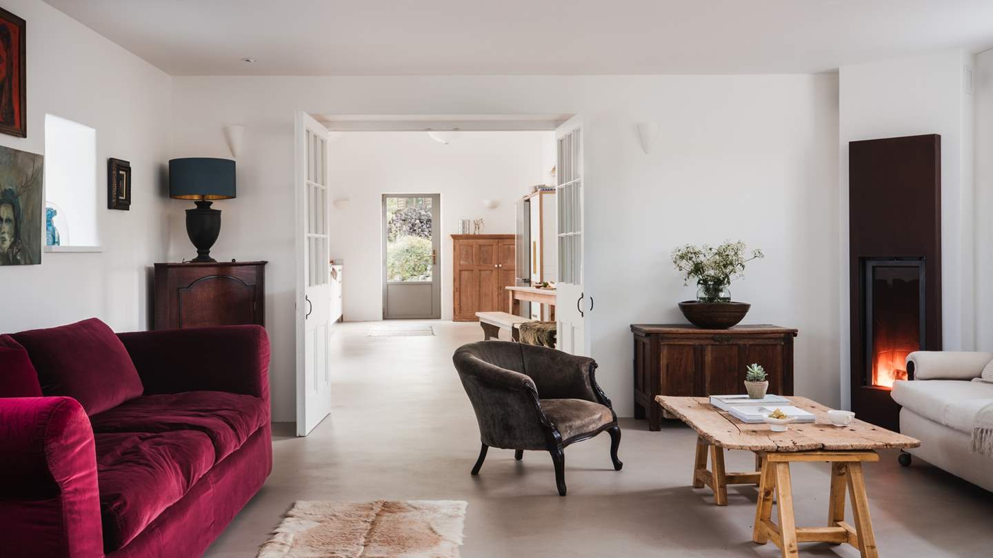 This stunning space is filled with historic and contemporary oil paintings tucked in ornate brass frames and original interior pieces such as a vintage Mallorcan coffee table