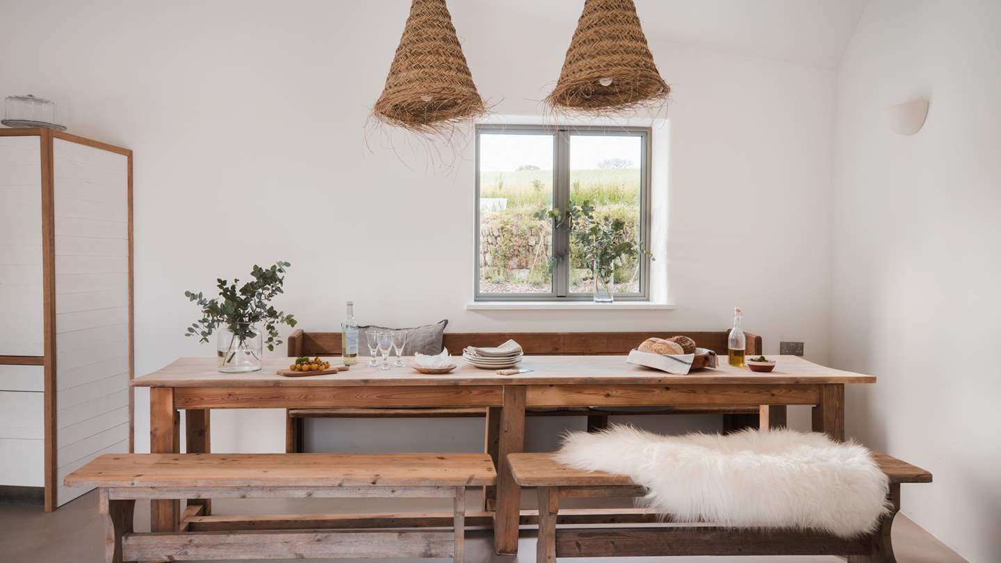 Folklore style feasting awaits around the understated solid pine dining table...