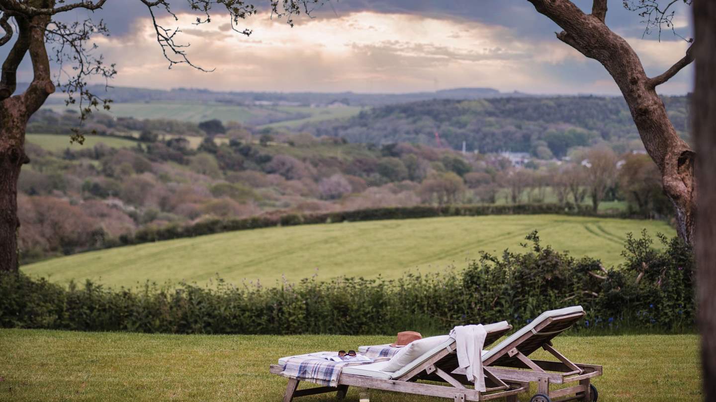 Head to the East terrace to find two reclining loungers to enjoy on sun-kissed days...