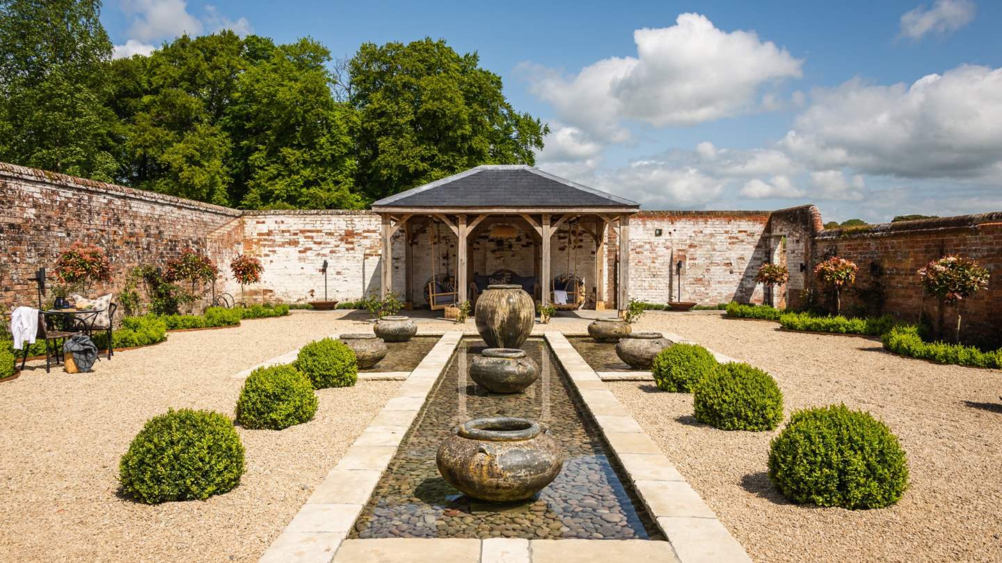 Step outside for dreamy afternoons spent admiring the glimmer of the water features and pools in the sunlight