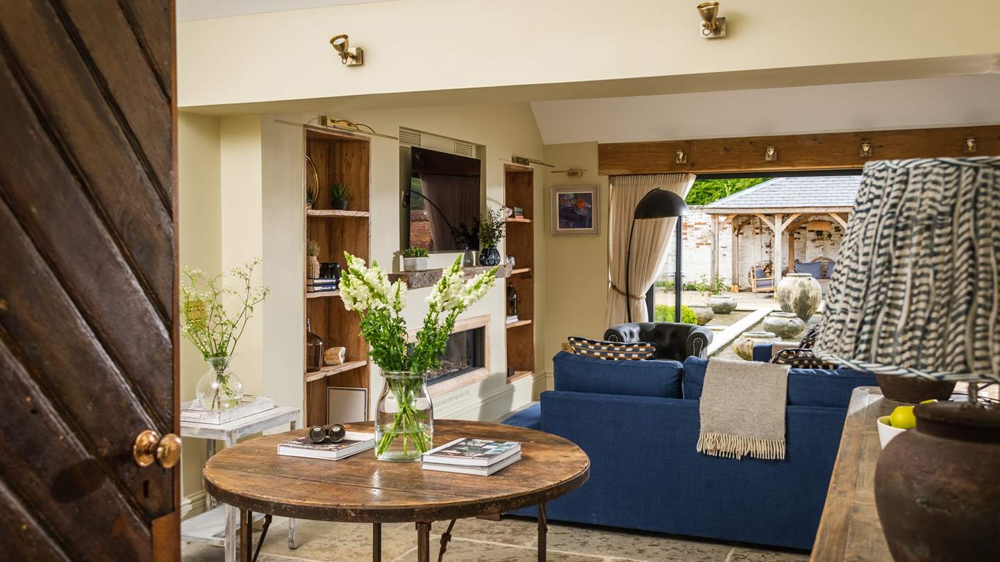 Showcasing vaulted ceilings and beautiful features, its open spaces are accentuated with cosy nooks and archways that add even more character to the room