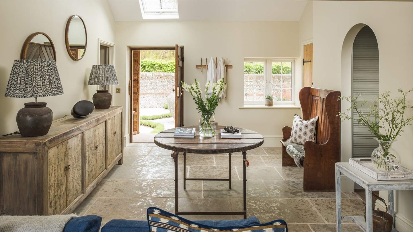 Full of charm, our single-storey homestay features an open-plan lounge, kitchen, and diner flooded with natural light and bathed in tranquil tones