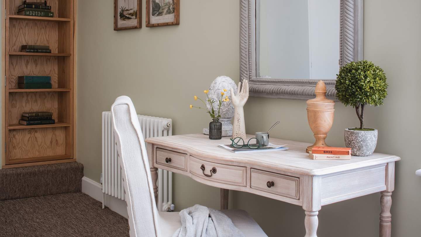 An elegant writing desk lends space for creativity 