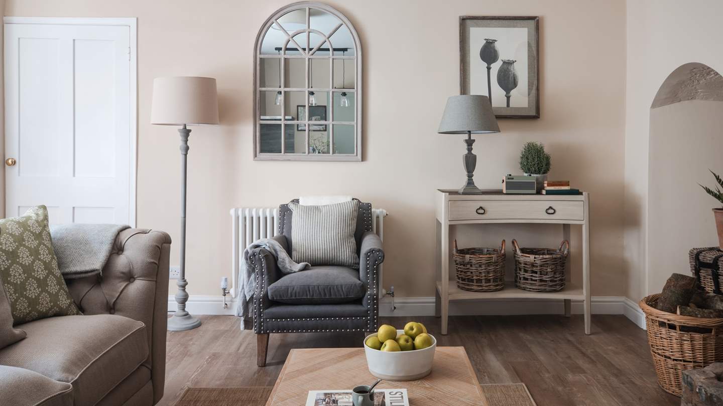 Unwind on the chic armchair with a glass in hand...