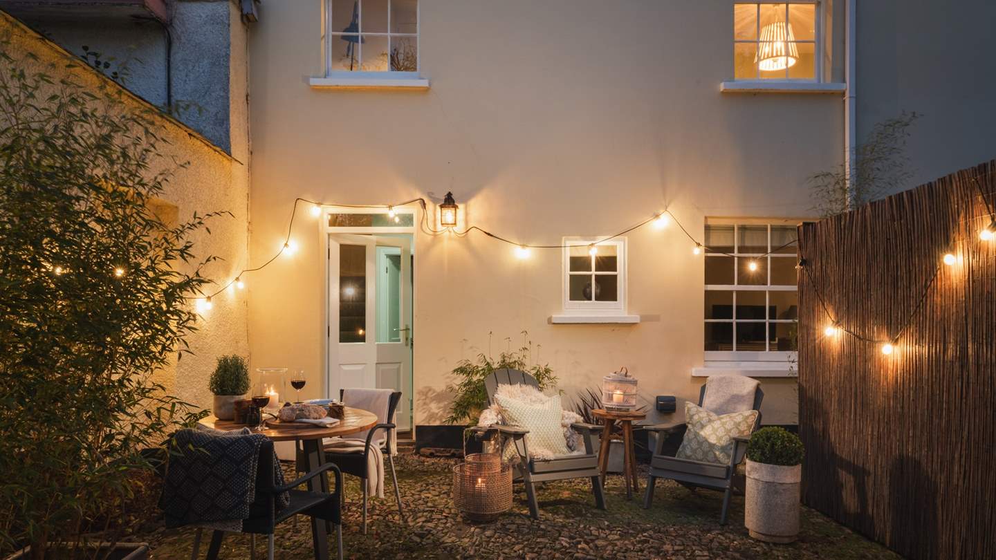 The beautiful enclosed garden enjoys a suntrap aspect, sheltered by thick stone walls and reed fencing