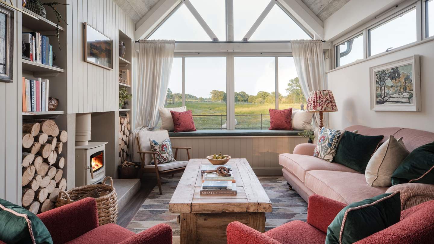 Step into the homely open plan living space, with breath-taking countryside views from the large pentagonal window