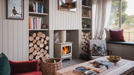 Relax and reset besides the Charnwood wood burning stove during the colder months
