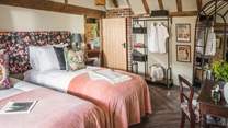 Bedroom four boasts a zip and link bed that can be used as two singles or a heavenly super king oasis