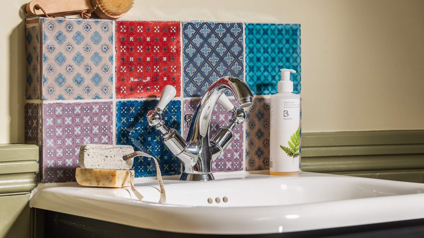 An en suite water closet with a basin and heated towel rail ensures you have everything you need for those self-care rituals