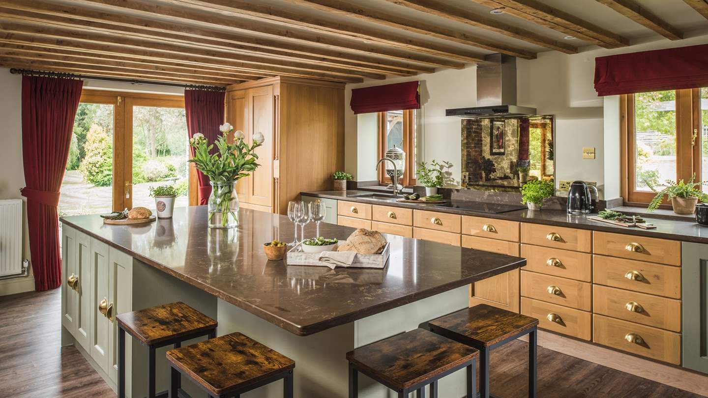 Gather at the gloriously large kitchen island as you chat the day away or turn your attention to the Nespresso machine for a perfectly roasted brew
