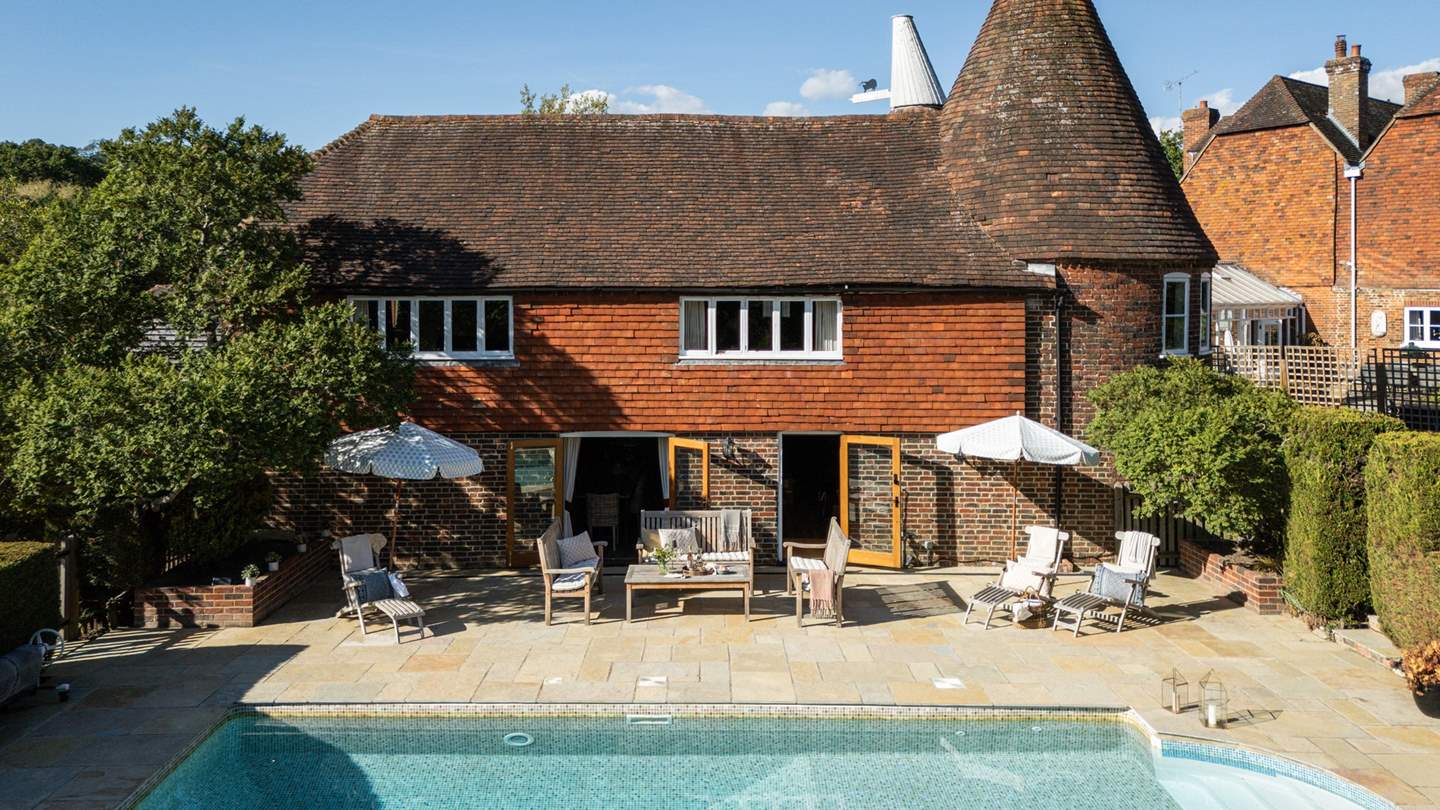 Whether you want to linger on one of the oh-so-comfy loungers, sip cocktails in the wicker seating area, or bathe in the refreshing waters as you take in your verdant surrounds