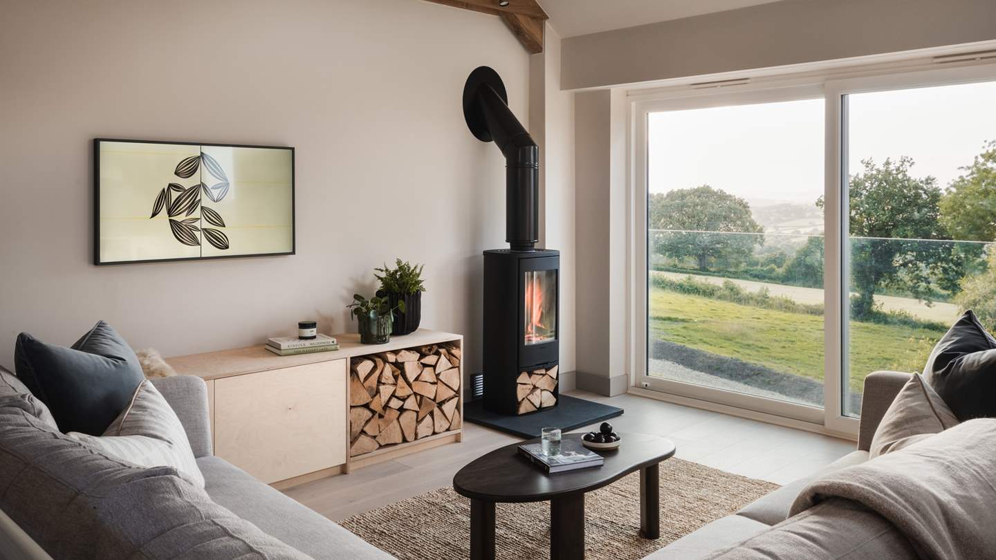 Overlooking gorgeous countryside scenes framed by floor-to-ceiling windows 