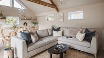 Bathed in calming, neutral hues and crowned with full-height vaulted ceilings 