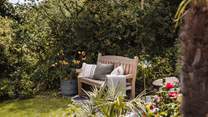 Seek moments of quietude in the pretty corners of our coastal garden 