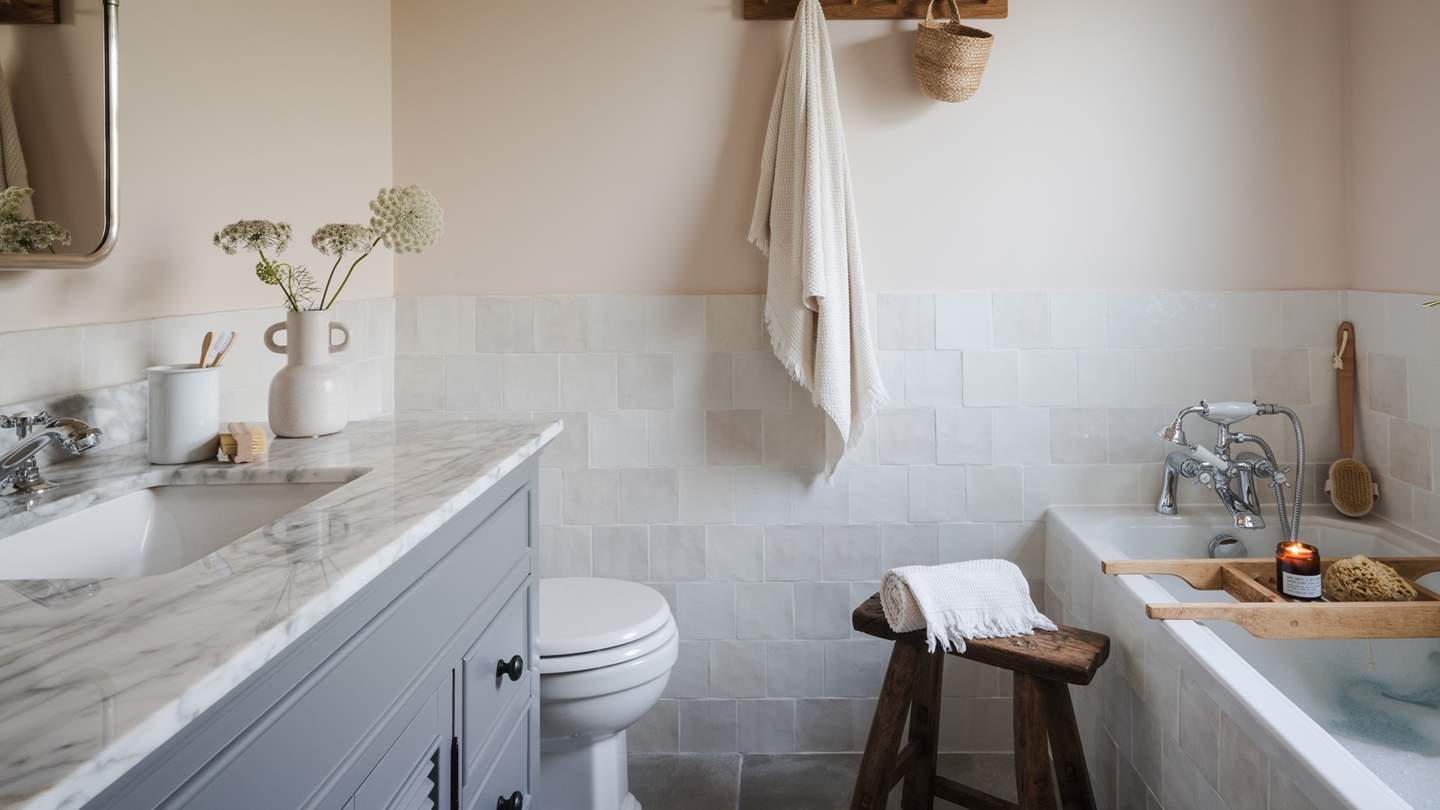 You'll find a bathtub and a separate shower for rejuvenating self-care moments