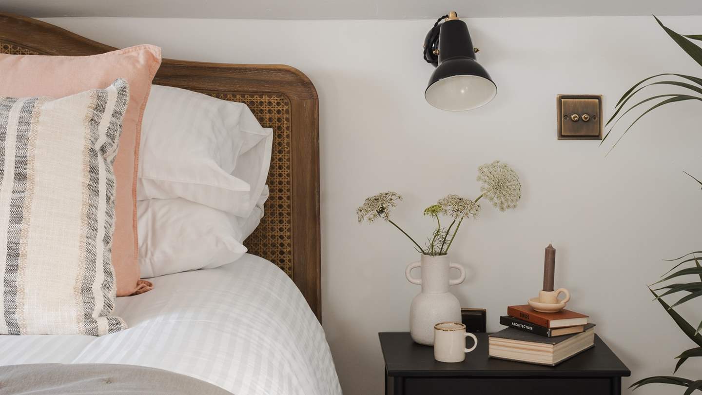 A king-sized rattan bed topped with super-soft linens promises sweet slumbers and lingering lie-ins