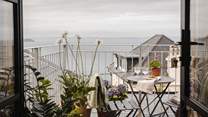 The stunning balcony offers a romantic setting to admire the Cornish coastline and beyond... 
