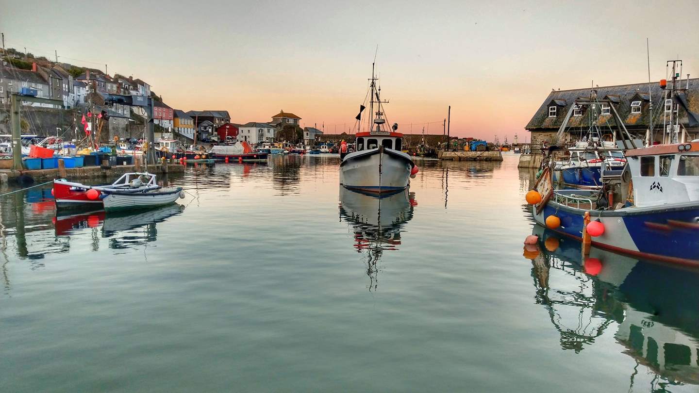 Savour sunset moments in the sweet fishing village of Mevagissey