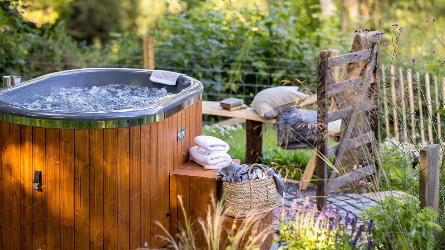 The wood-fired hot tub is simply a dream
