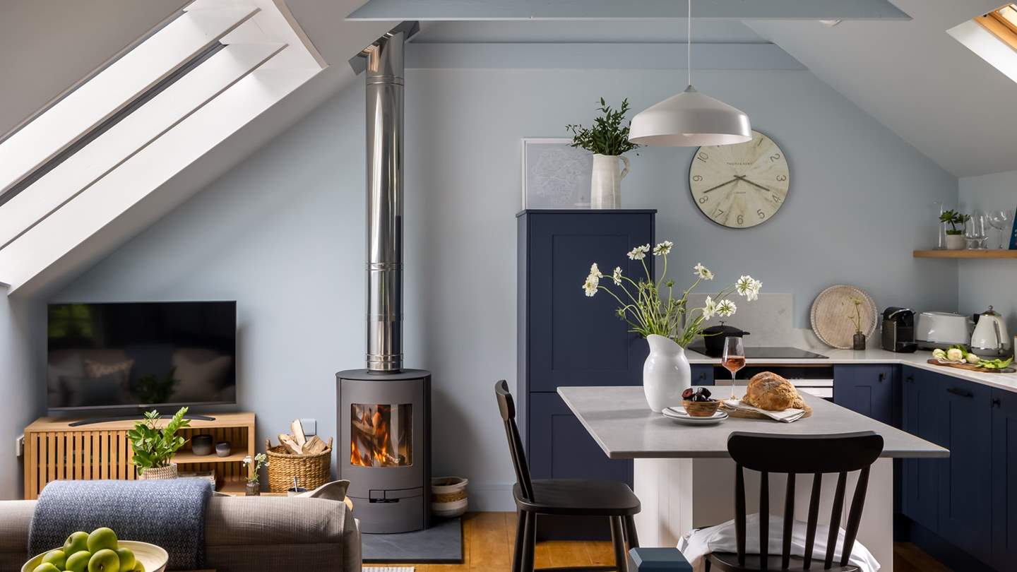 Akin promises a blissful escape whatever the season, with a wood burning stove at the heart of the open-plan living space 