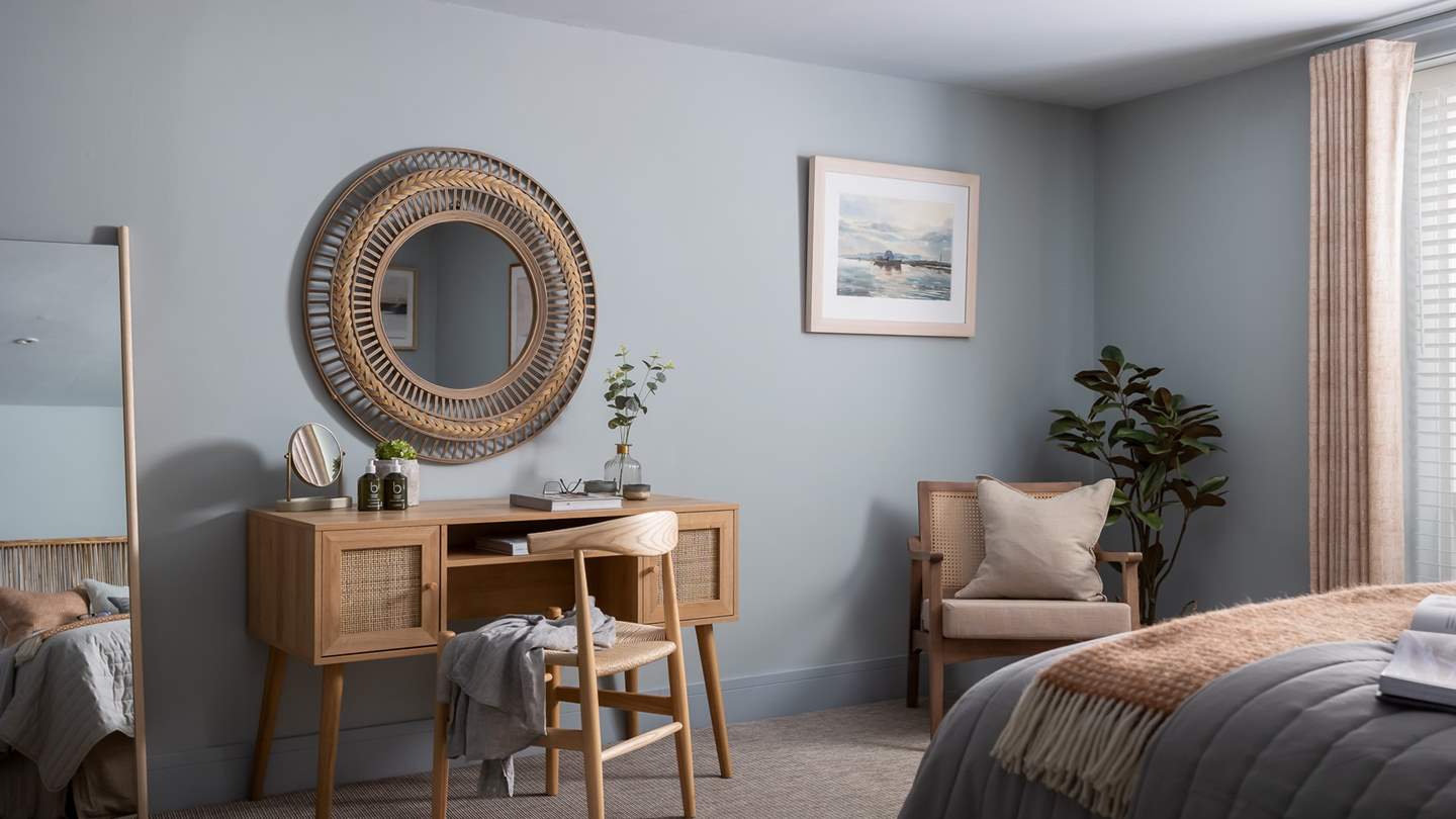 This large and inviting space is simply a dream, with the addition of a dressing table for pampering moments