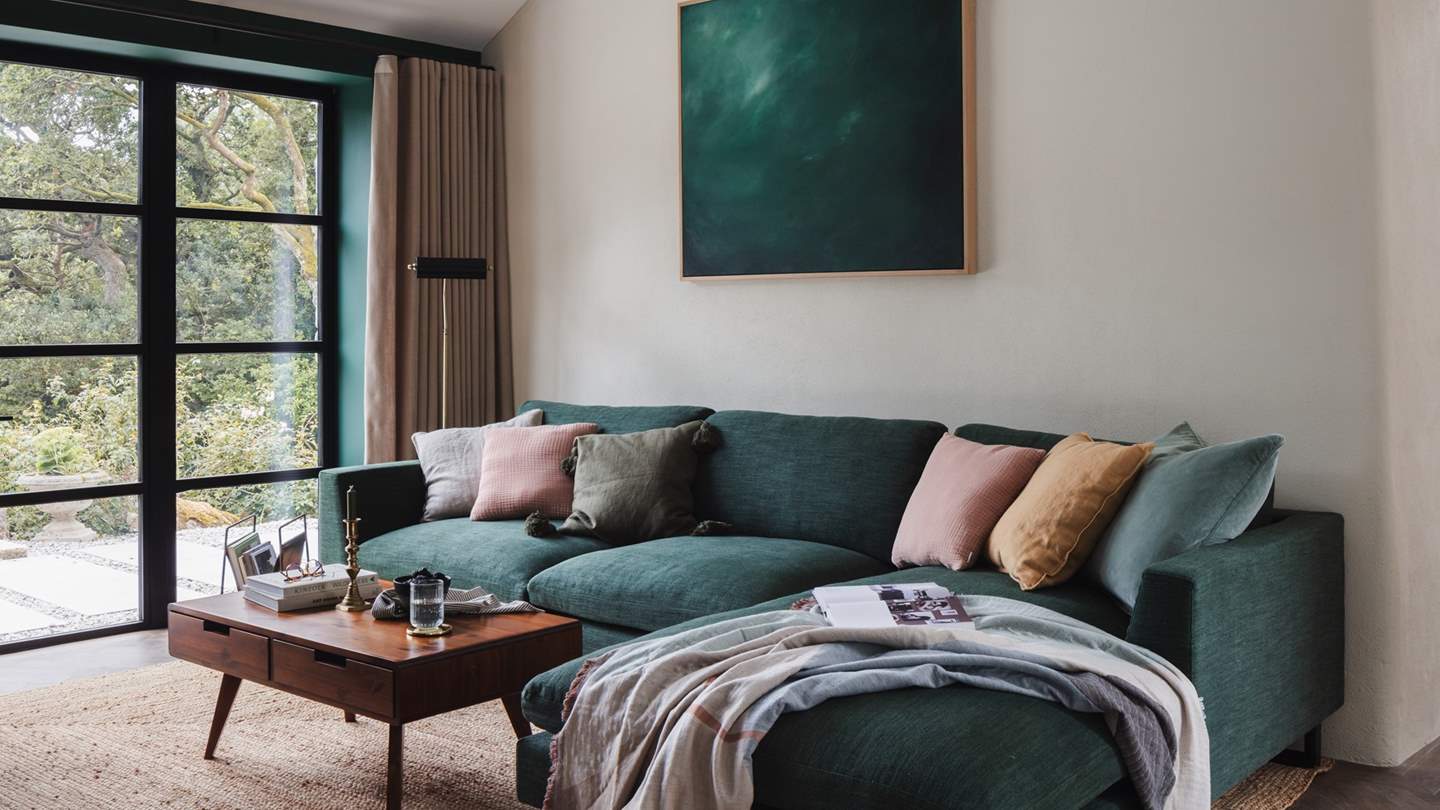 Adorned in forest-green tones, this space is an aesthetic dream... 