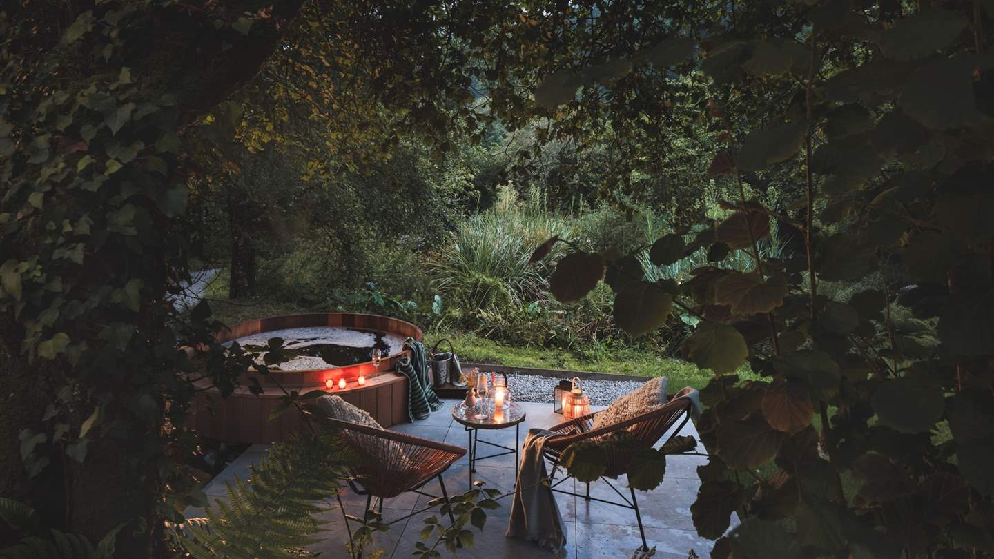 Moonlit dips in the cedar clad hot tub await... 