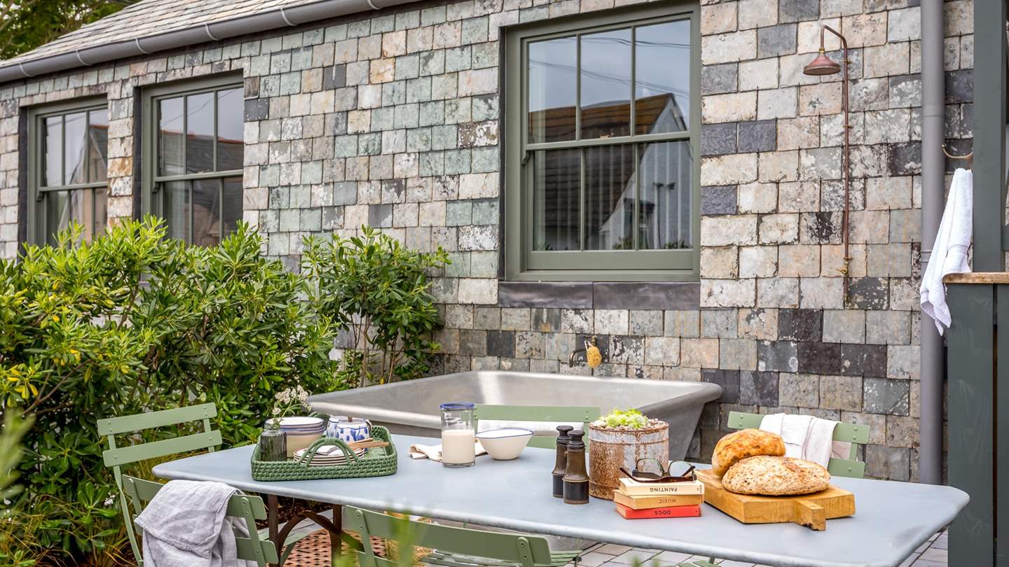 You’ll find a heated outdoor shower for rinsing sandy toes and paws after days spent at the beach, with the addition of a stunning zinc William Holland bathtub for bubble-topped moments under star-lit skies