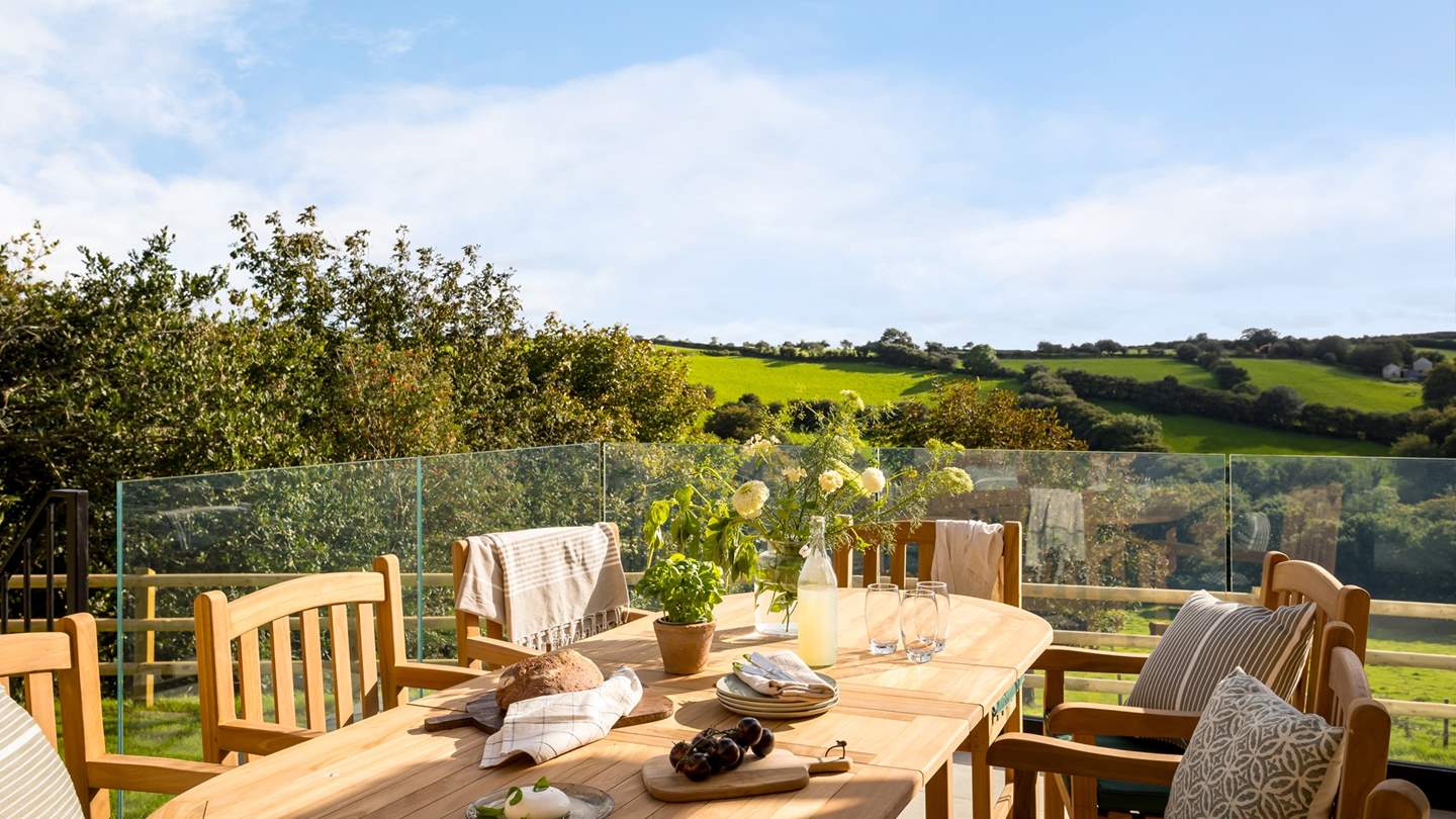 With an outdoor table and chairs promising many sun-soaked meals