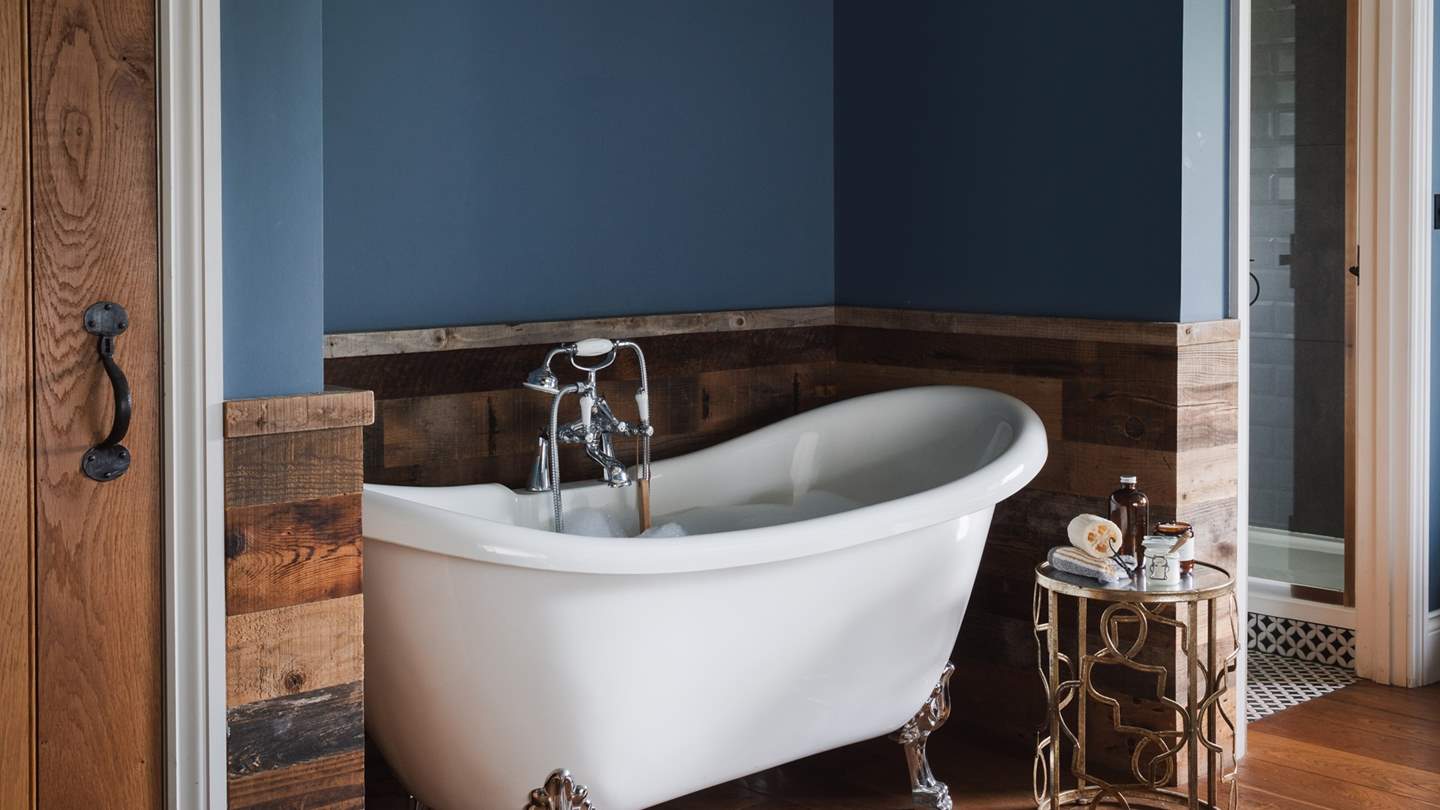 Seek moments of bubble-topped bliss in the heavenly rolltop bathtub...