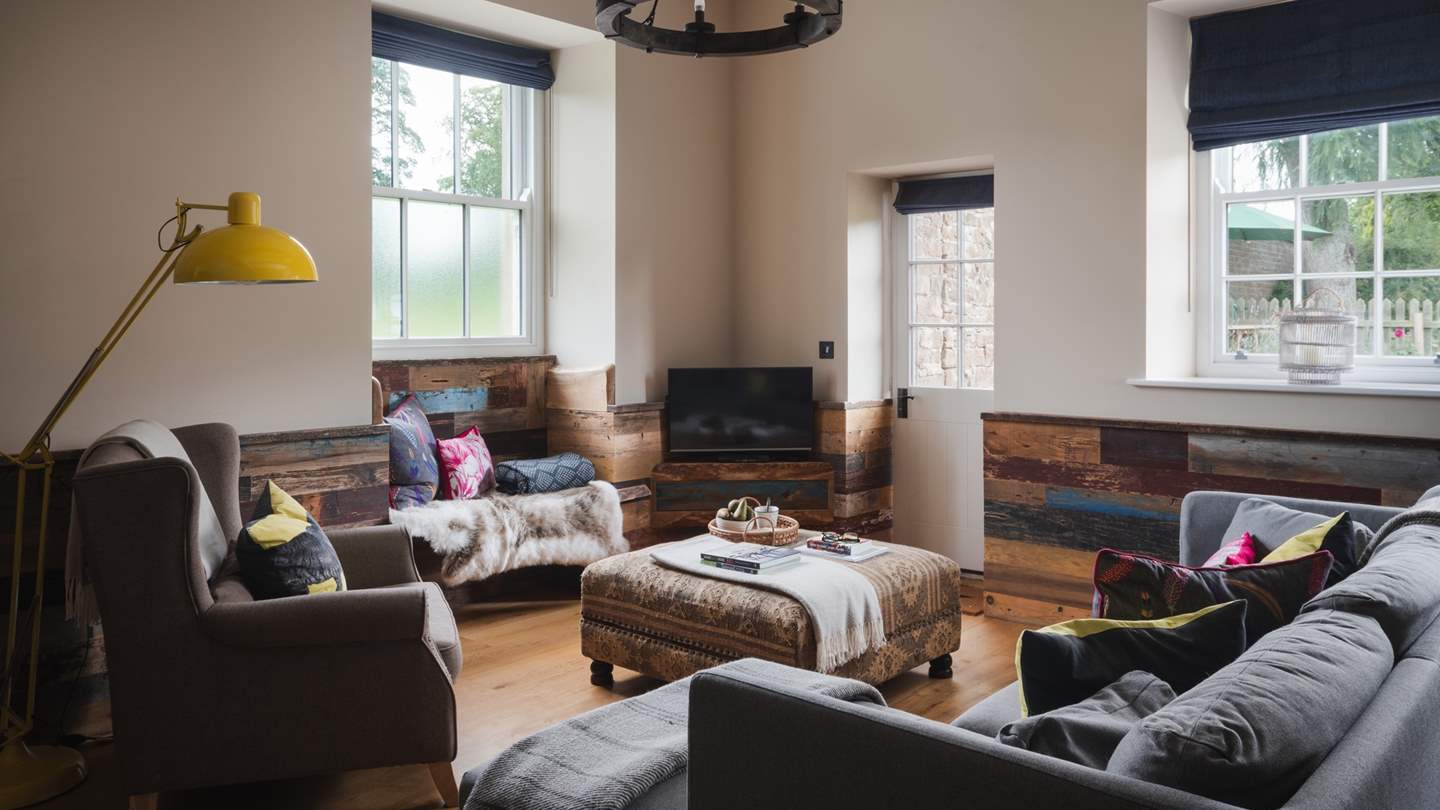 In the living space,  country charm and rustic details blend with quirky interior pieces