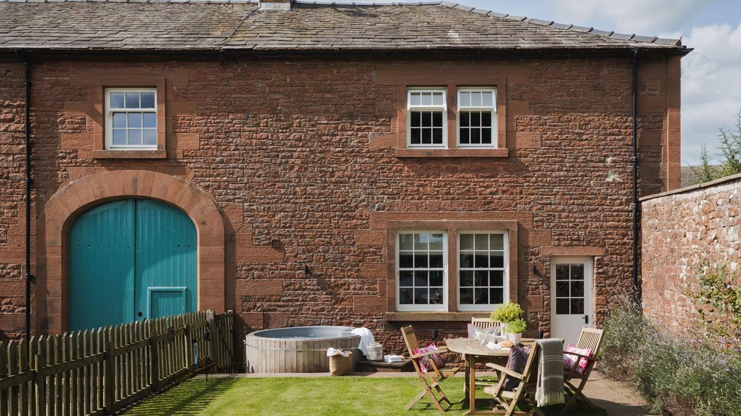 Uncover the sweet, walled courtyard garden, where a spacious lawn, pretty lavender borders and countryside vistas make for enchanting staycation moments