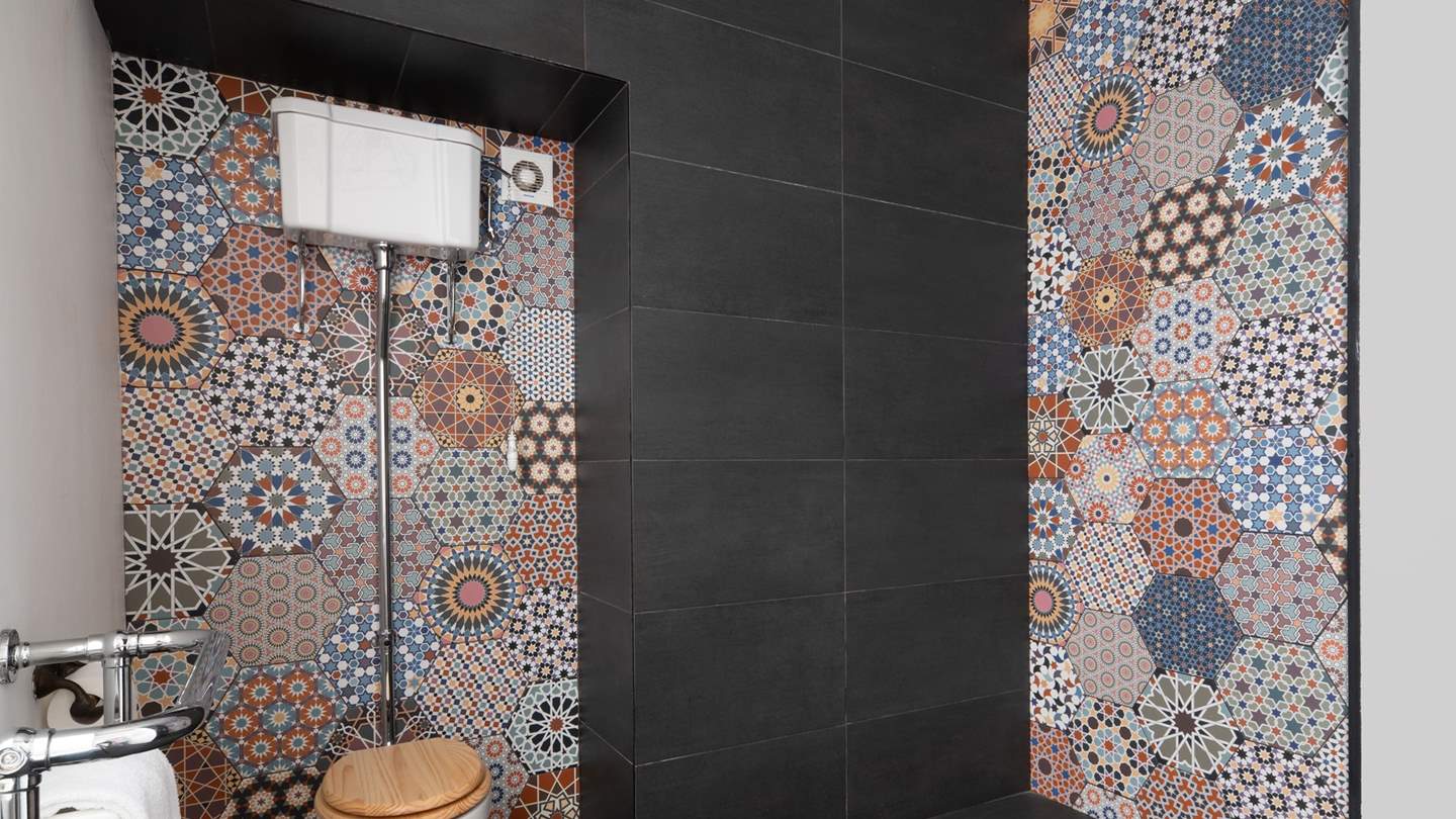 The downstairs bathroom is complete with a large walk-in rainfall shower for refreshing wake-me-up moments