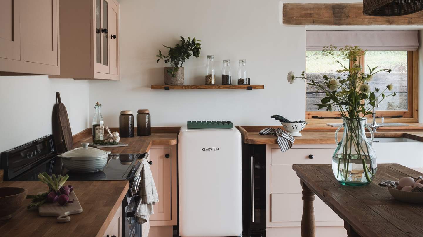 You’ll also find a Smeg oven and hob, dishwasher, washing machine, tumble dryer, and a fridge-freezer
