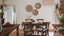 A wooden dining table for four is a wonderful setting for formal dining and pared-back brunches... 