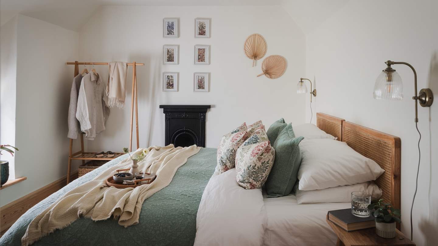 Promising a Victorian feature fireplace and a lacing of botanical touches, the second bedroom is a divine spot for interrupted countryside slumbers