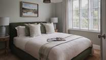 Osprey’s fifth bedroom is a heavenly idyll bedecked in a soft sage palette 