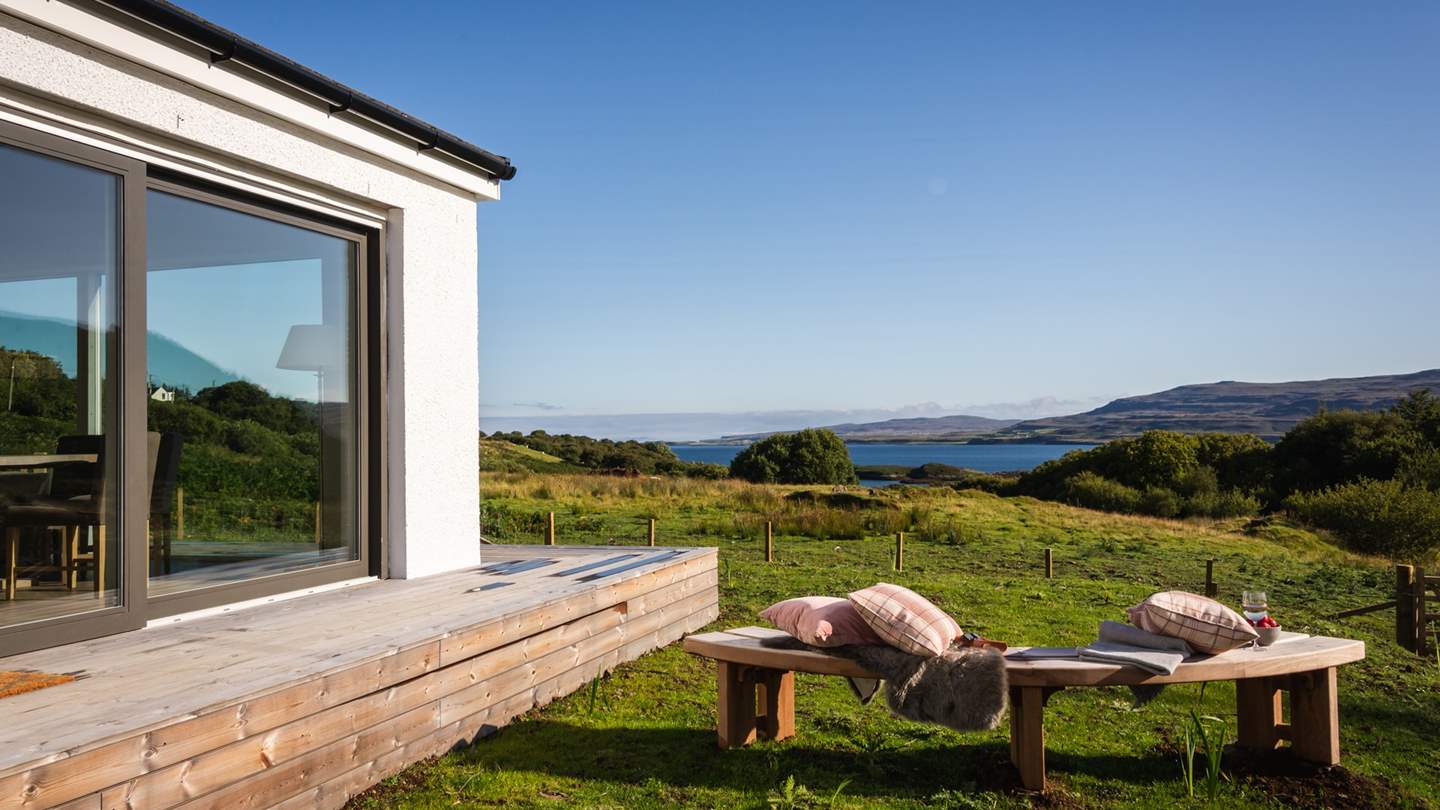 Soak up the majestic Lochside and mountainous vistas in Tigh an Tobair's verdant garden