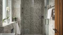 Seek refreshing wake-me-up moments in the ensuite shower room