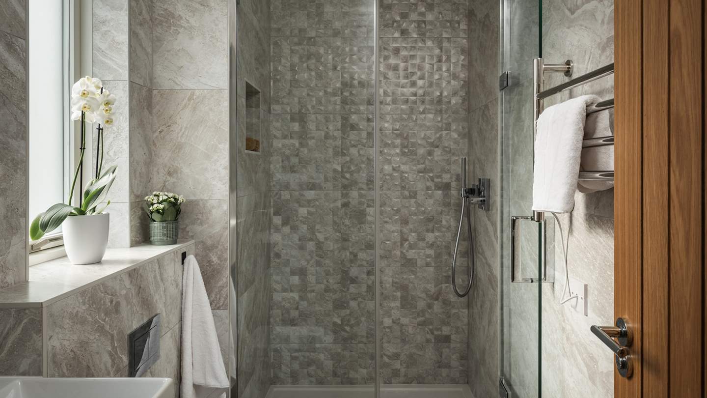 Seek refreshing wake-me-up moments in the ensuite shower room