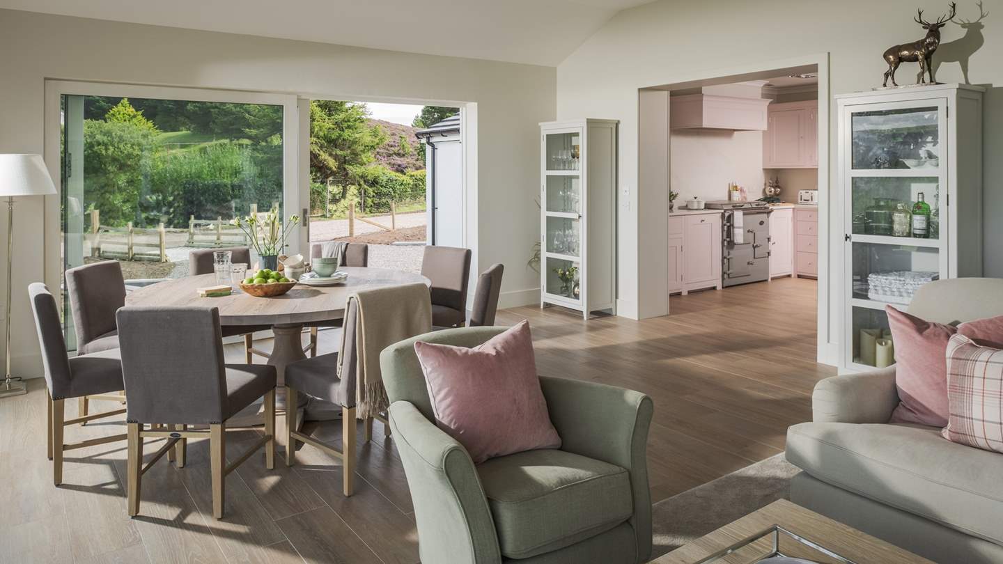 The heart of the home, the open-plan lounge features a beautiful lounge and dining area and adjoins both the kitchen and a gorgeous snug
