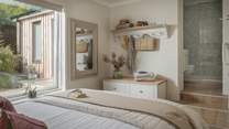 This bedroom is finished with its own ensuite shower room with underfloor heating.